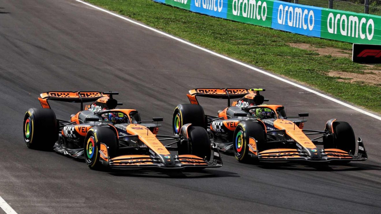 Oscar Piastri overtakes McLaren team-mate Lando Norris at Monza.