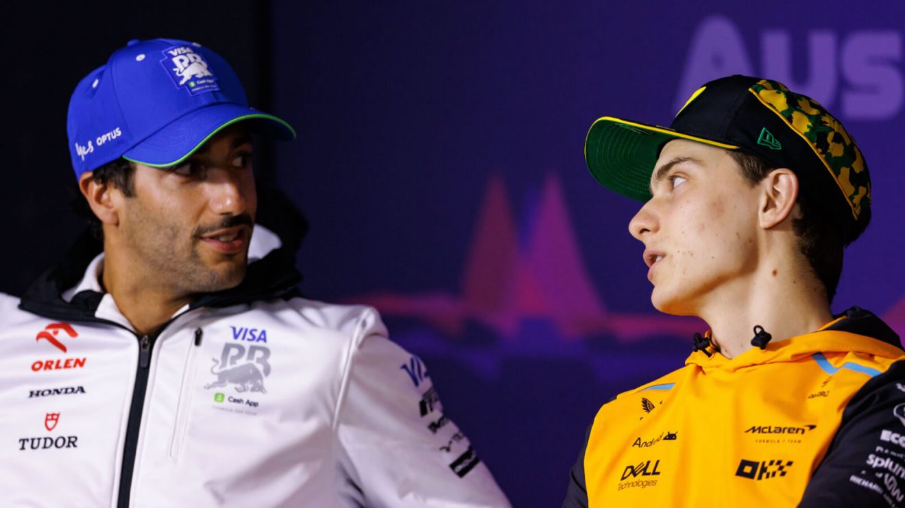 Daniel Ricciardo speaking with Oscar Piastri