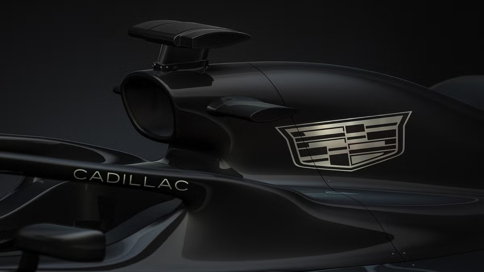 An F1 car with the Cadillac logo on it