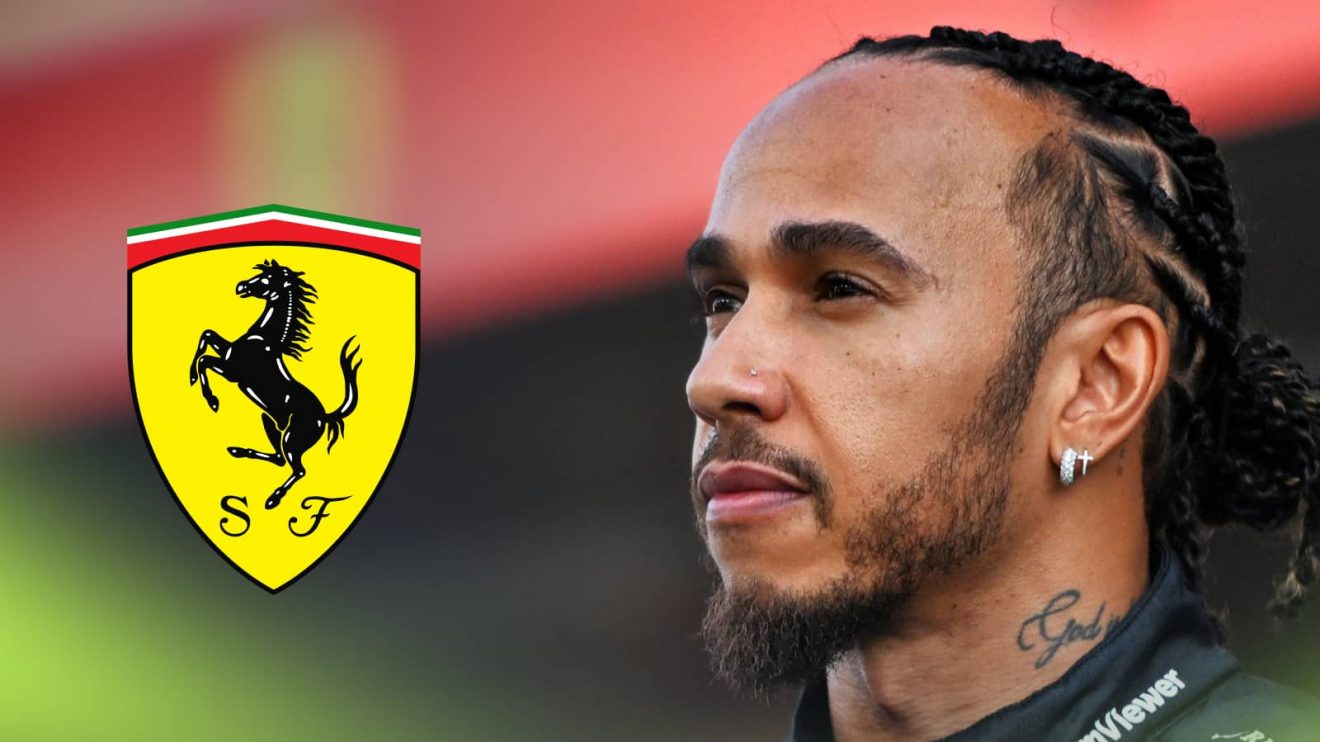 Lewis Hamilton poses at Mercedes' end-of-2024 photocall with a prominent Ferrari logo alongside him