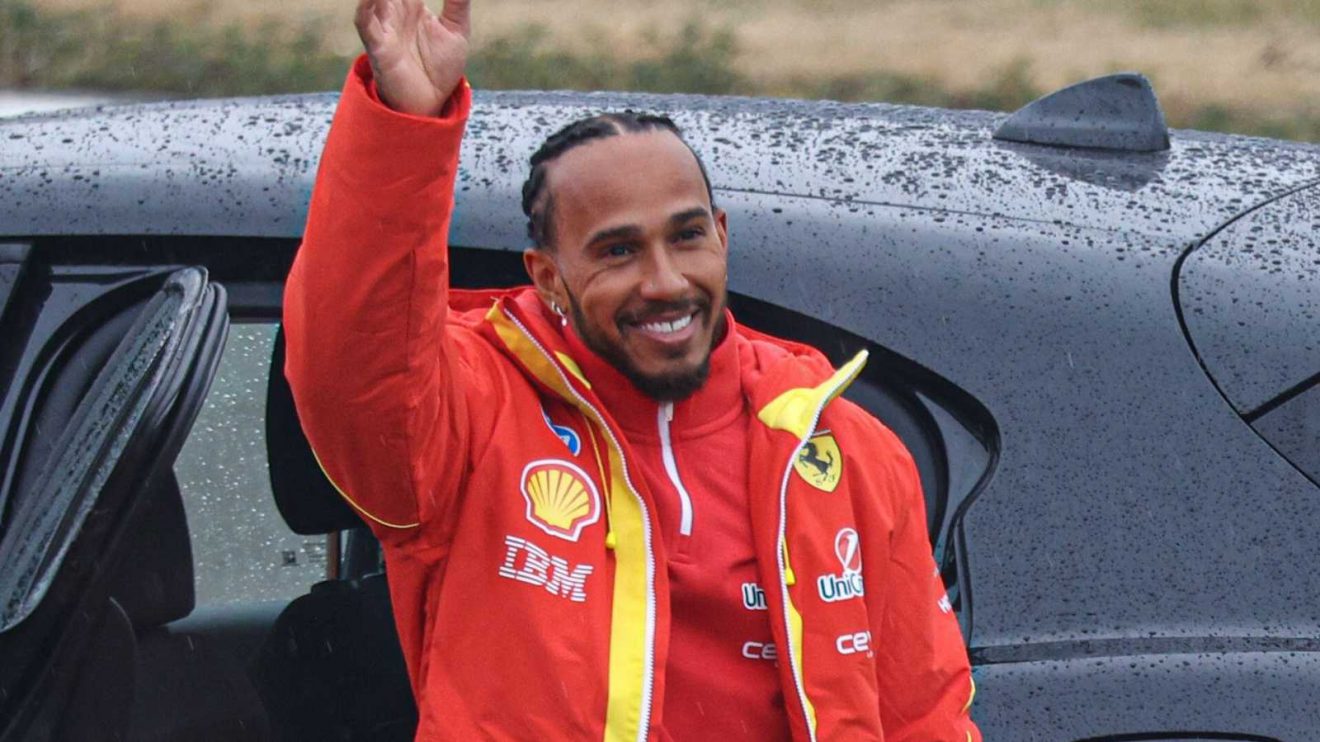 Lewis Hamilton waves to Ferrari fans at Fiorano.