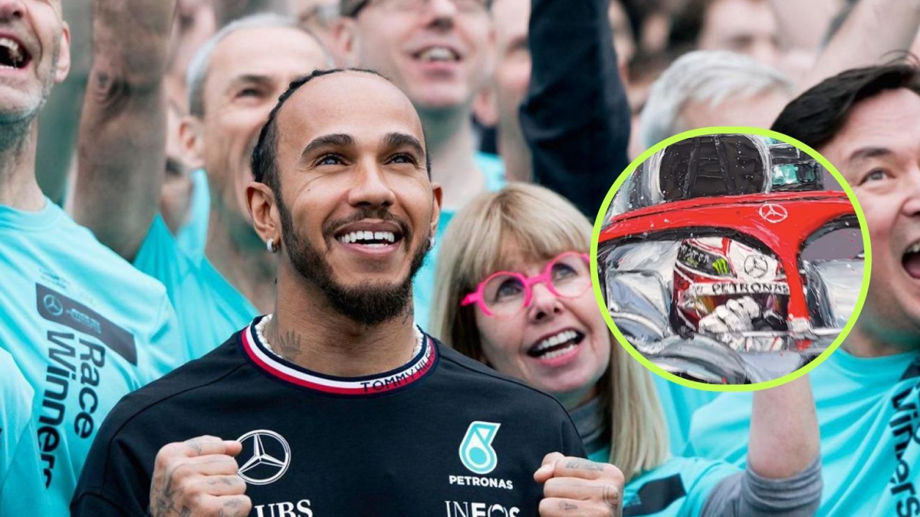 Lewis Hamilton with Mercedes staff