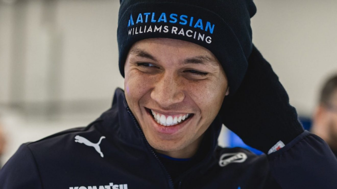 Alex Albon smiling on launch day for the Williams FW47