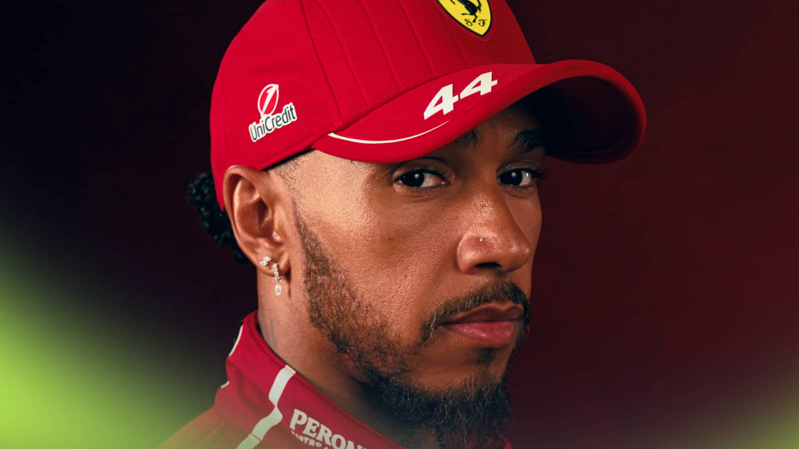 Lewis Hamilton looks at the camera for a Ferrari SF-25 launch shot