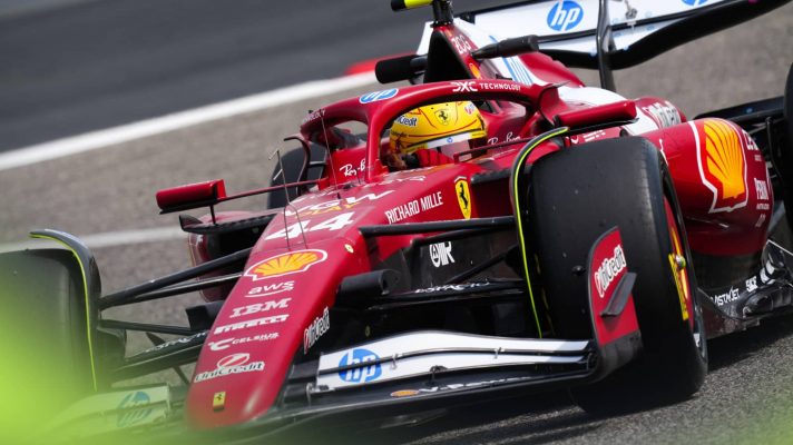 Ferrari driver Lewis Hamilton navigates Turn 10 in pre-season testing in Bahrain