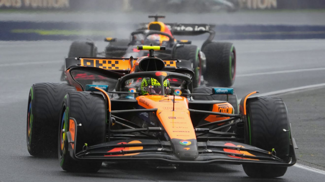 Max Verstappen chasing Lando Norris in the rain