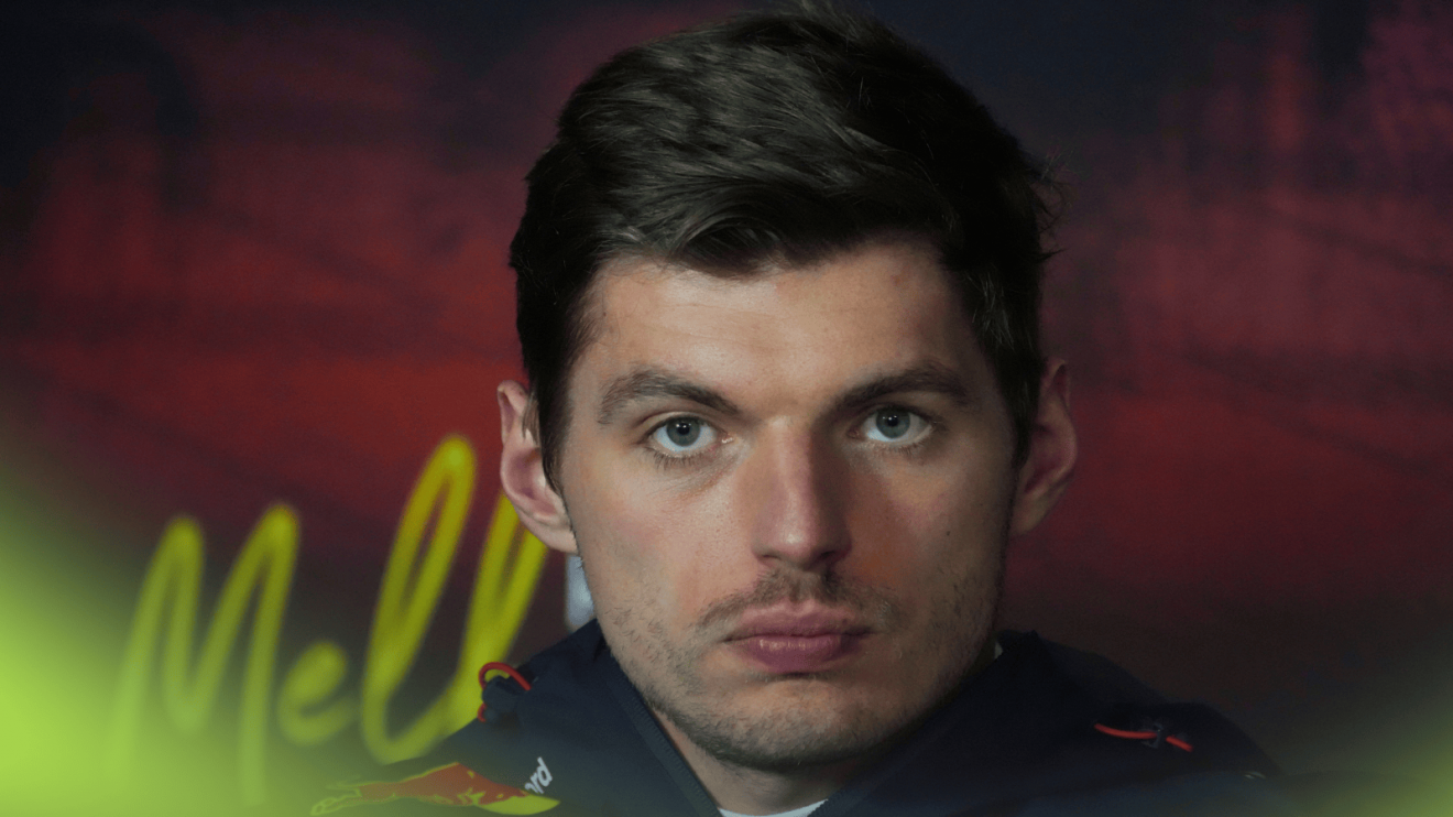 Max Verstappen looks stern in a press conference