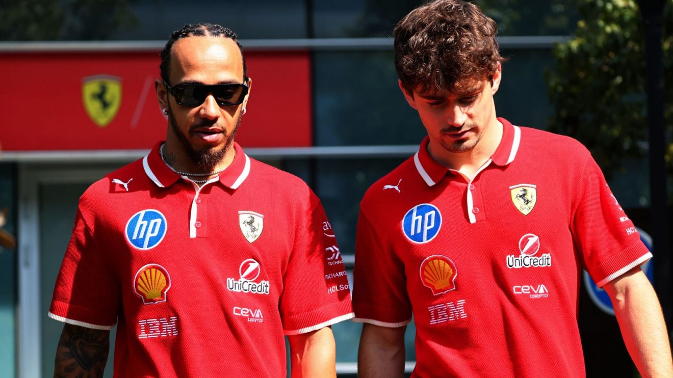 Ferrari drivers Lewis Hamilton and Charles Leclerc walk together at the 2025 Chinese Grand Prix
