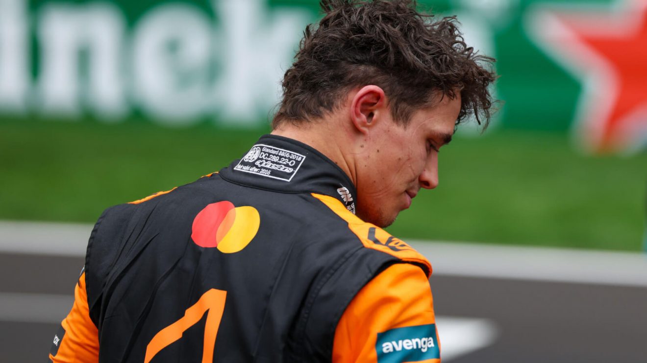 Lando Norris with his head down