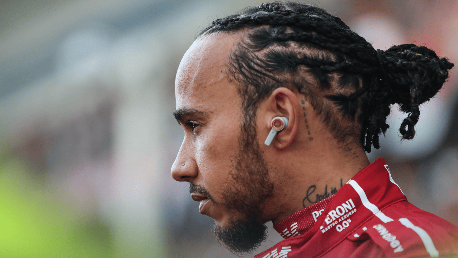 A side-profile shot of Lewis Hamilton on the starting grid in China