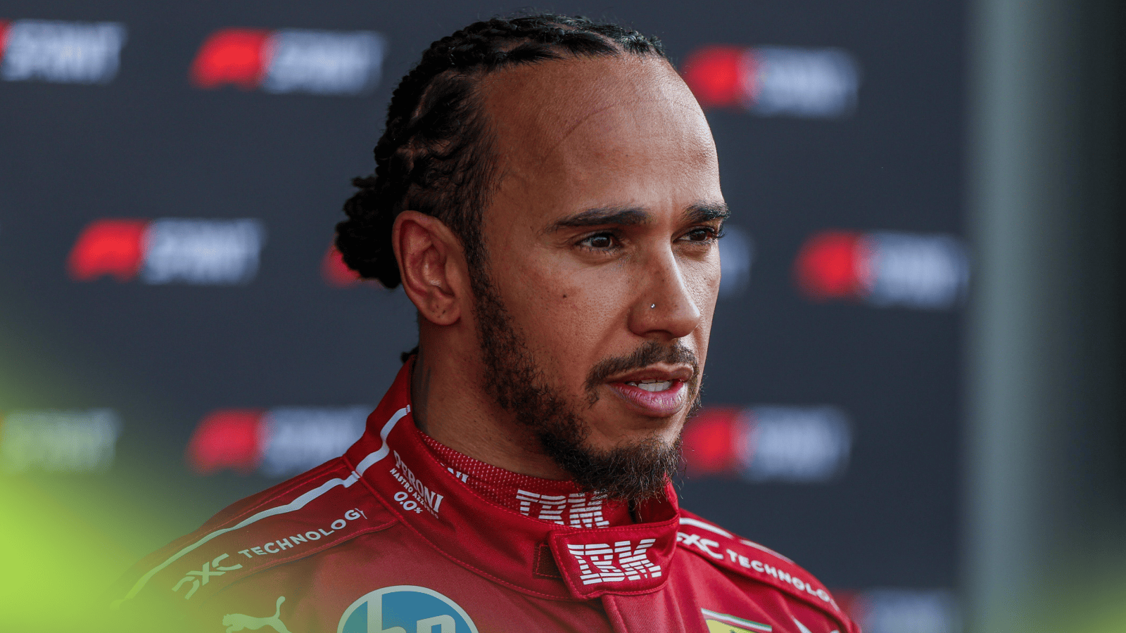 Lewis Hamilton speaks to the media in China