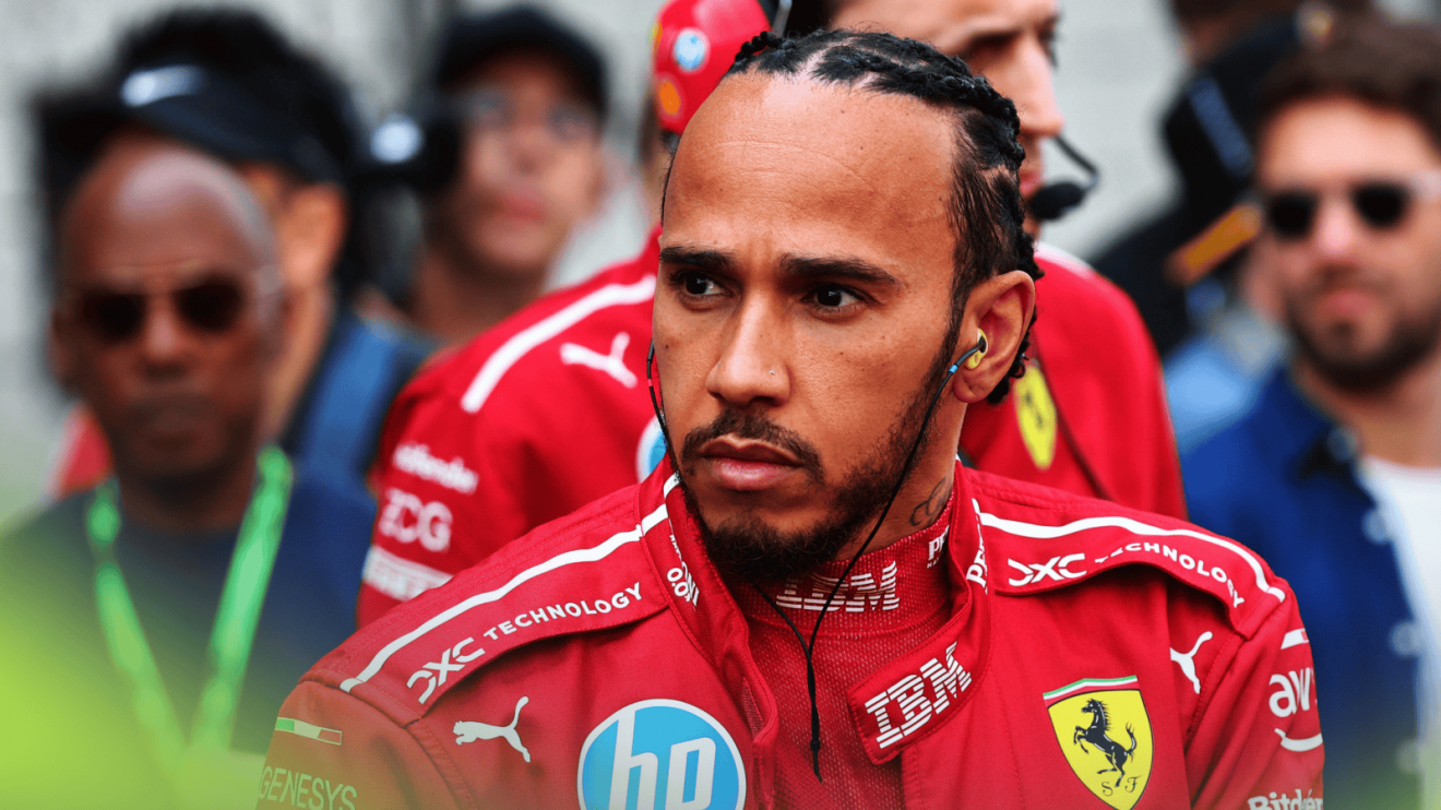 Lewis Hamilton looks concerned on the grid in China