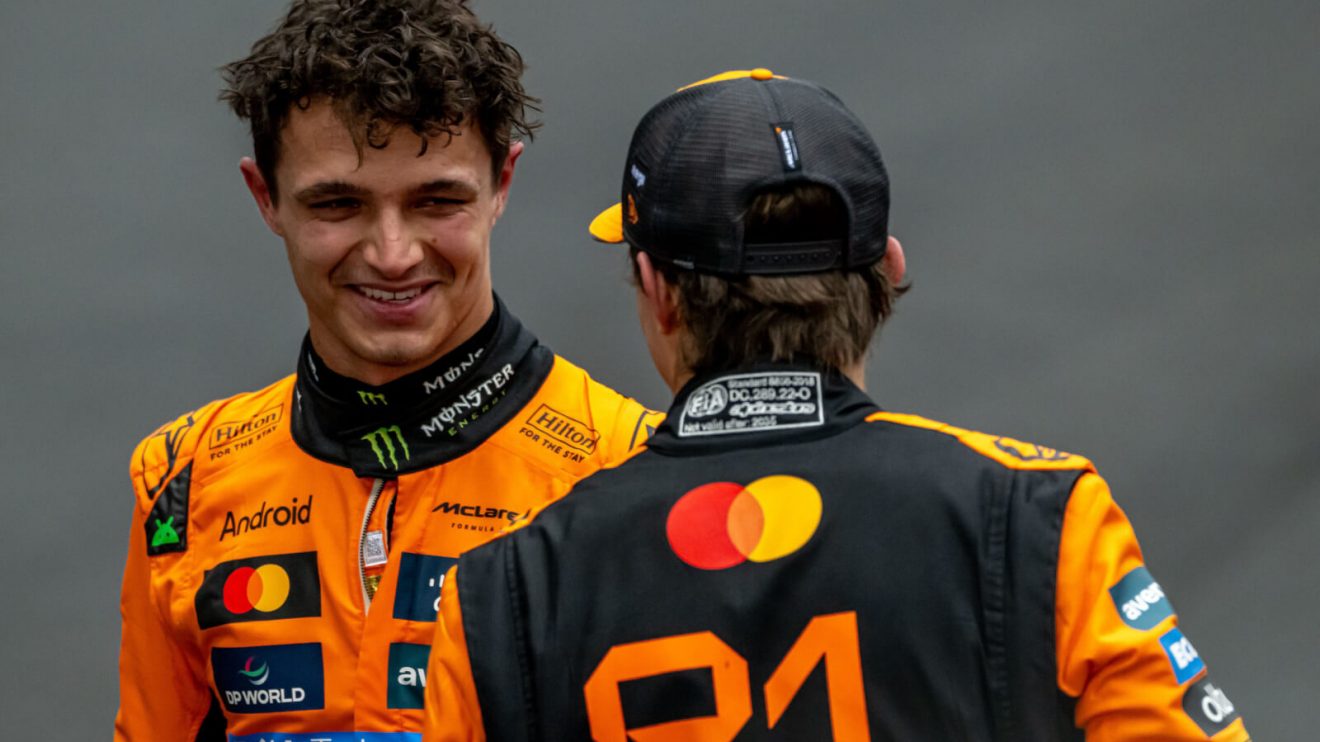 Lando Norris smiling with Oscar Piastri