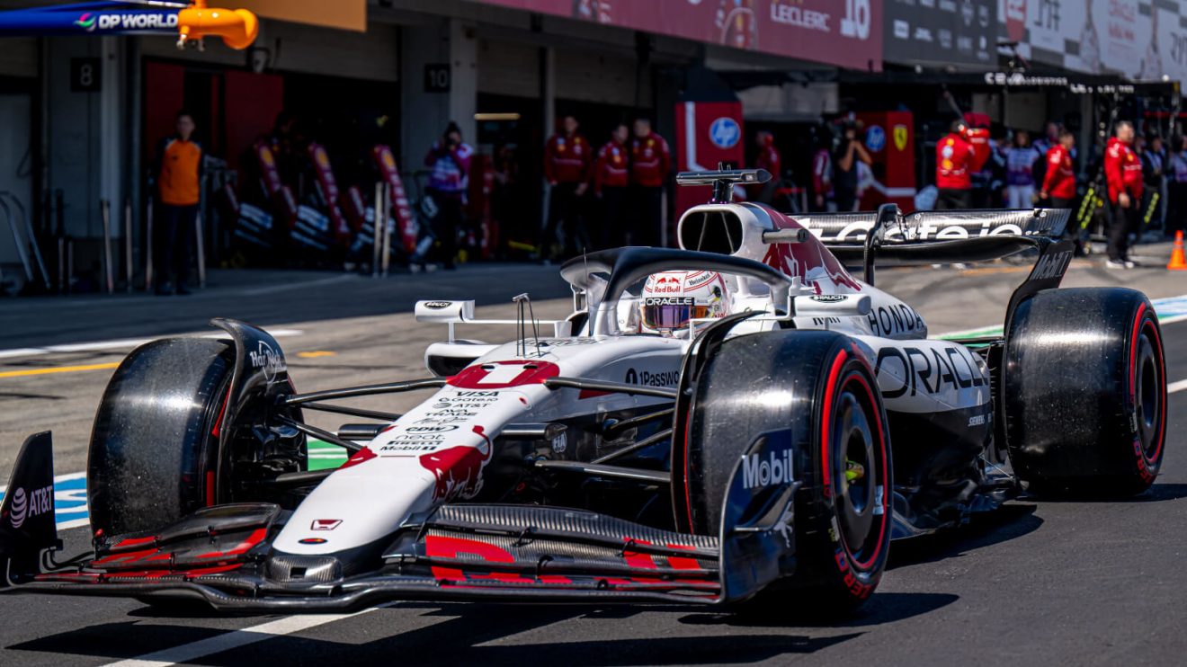 Max Verstappen heads down the pit lane in his Red Bull