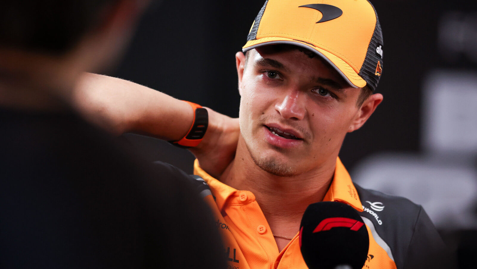 Lando Norris is interviewed in the paddock