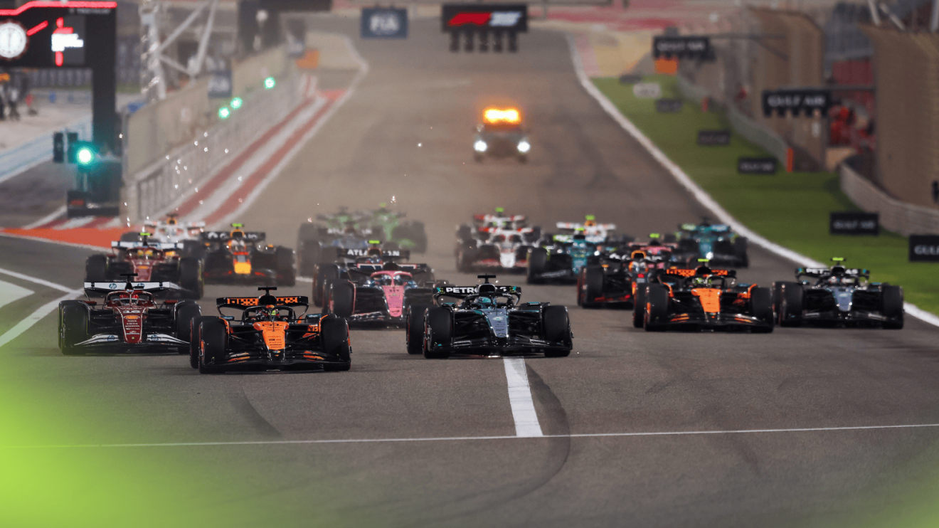 Oscar Piastri leads the field down to Turn 1 at the start of the 2025 Bahrain Grand Prix