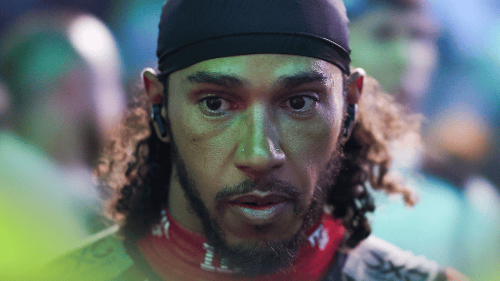 A close-up shot of Lewis Hamilton looking strained on the grid in Jeddah