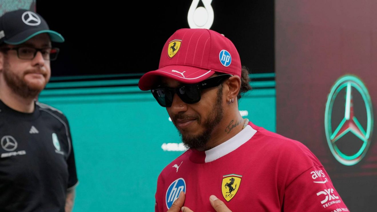 Ferrari's Lewis Hamilton stood in front of the Mercedes entrance at the 2025 Saudi Arabian Grand Prix