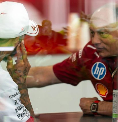 Ferrari's Lewis Hamilton and Fred Vasseur in discussion at the 2025 Miami Grand Prix