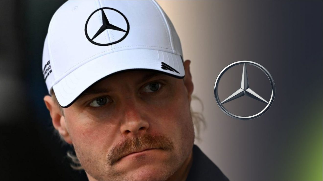 Mercedes reserve driver Valtteri Bottas looking stern at 2025 Bahrain testing, with the Mercedes logo to his right