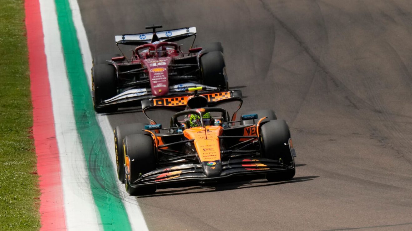 Lando Norris leads Charles Leclerc at Imola