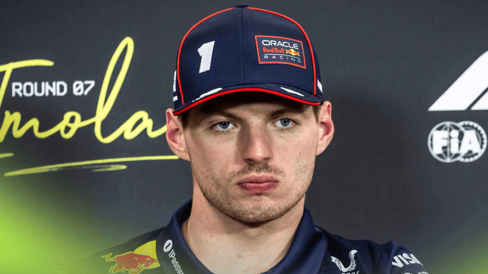 Max Verstappen looks on in a press conference