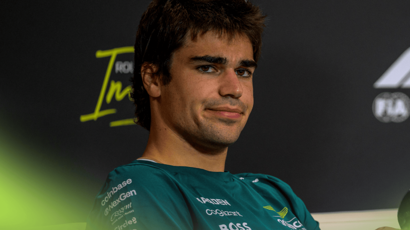 Lance Stroll looks on in a press conference