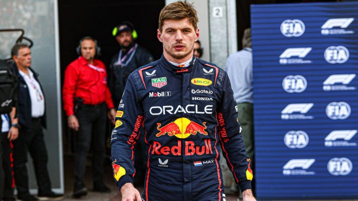 Red Bull's Max Verstappen walking with purpose at the 2025 Monaco Grand Prix