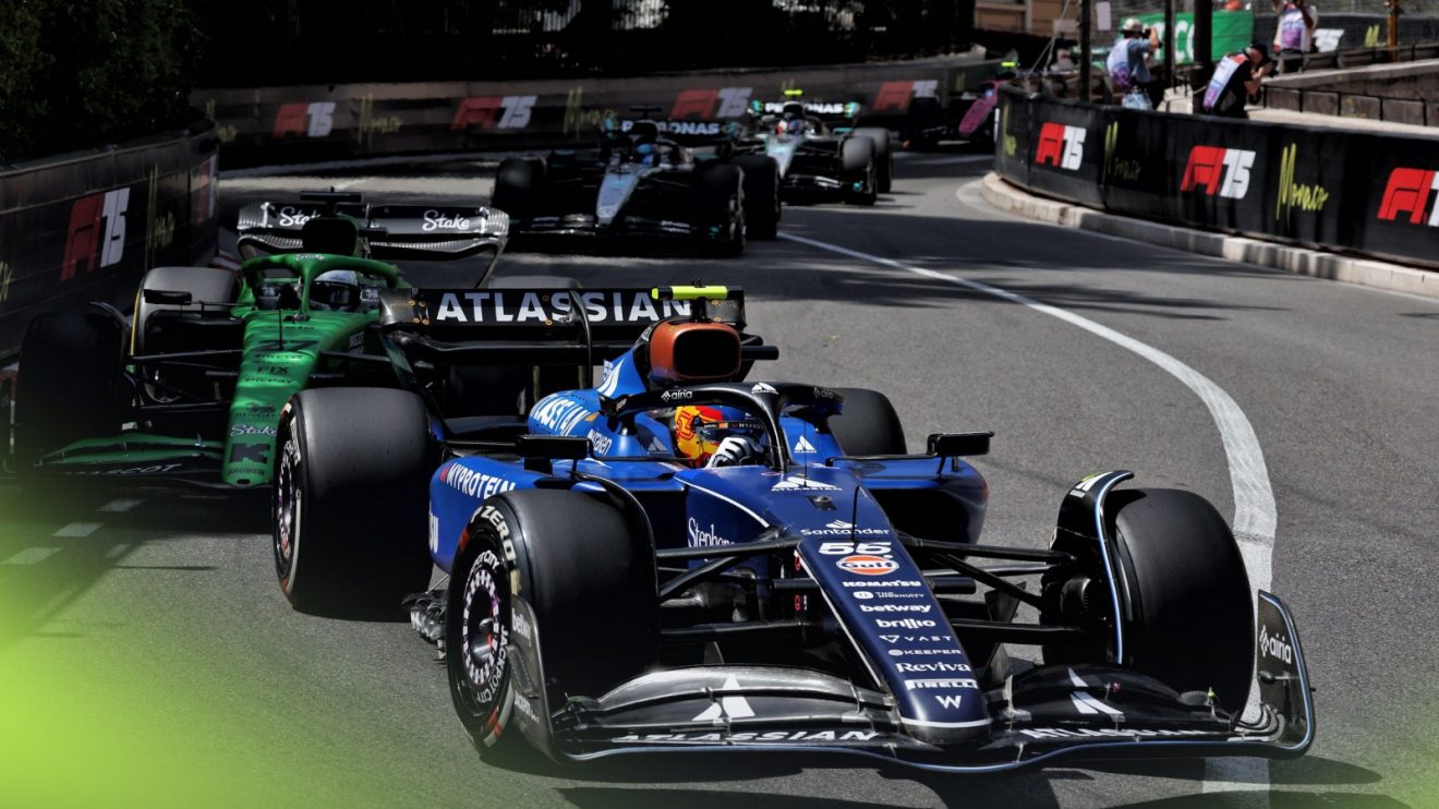 Carlos Sainz in the Williams leads a train of cars at the 2025 Monaco Grand Prix
