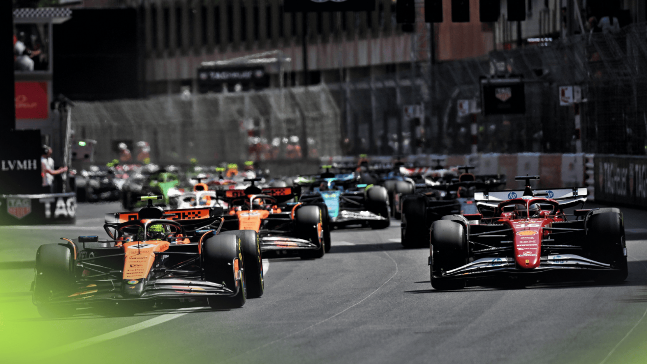 Lando Norris leads the field off the line at the start in Monaco
