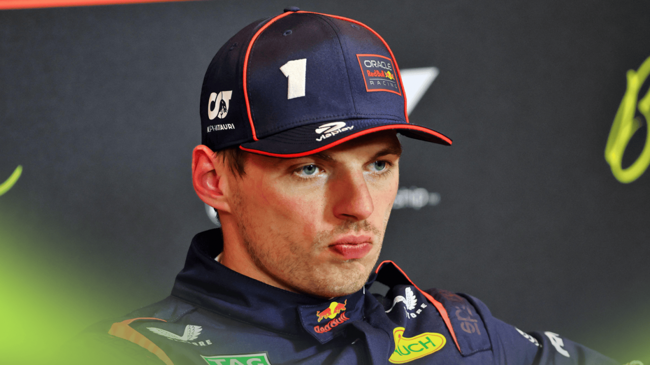 Max Verstappen looks annoyed in a press conference at the Spanish GP