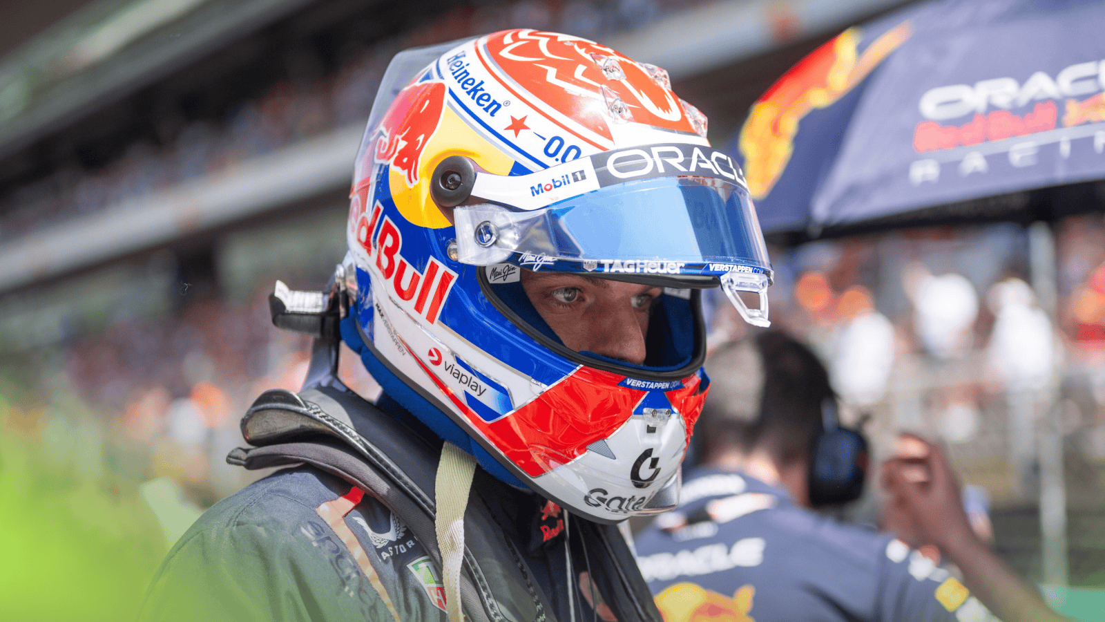 Max Verstappen wearing his helmet with the visor open on the grid in Spain