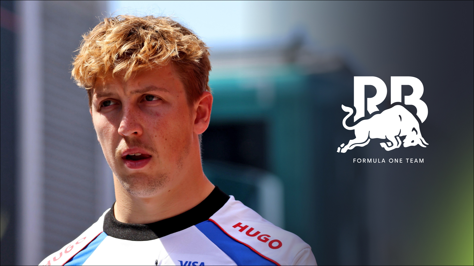 Racing Bulls driver Liam Lawson walking through the F1 paddock.