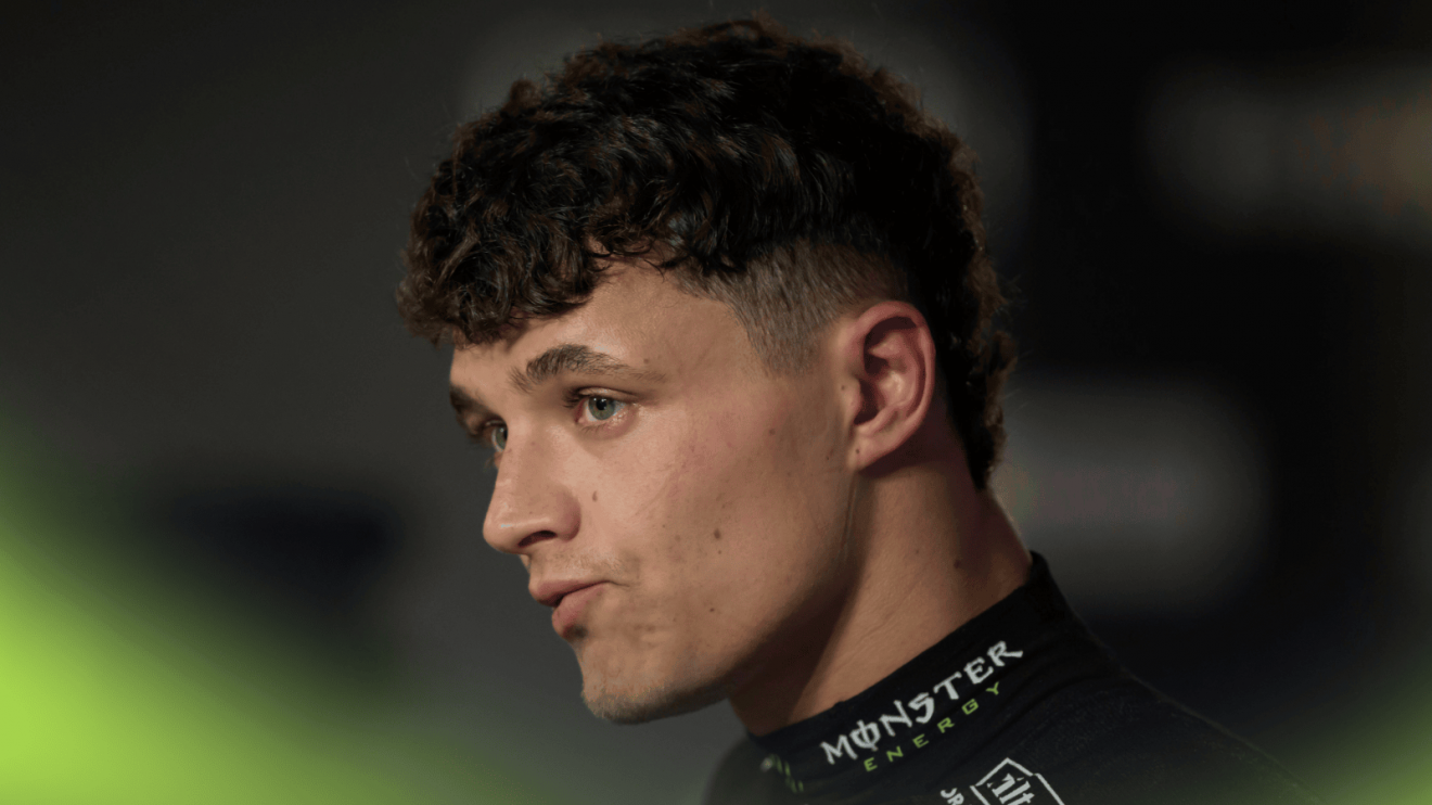 Lando Norris looks uncomfortable as he faces the media