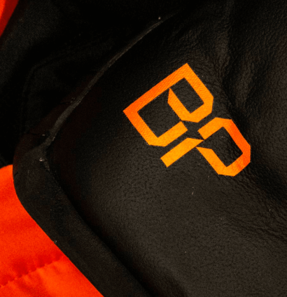 A set of McLaren F1 overalls featuring Brad Pitt's initials
