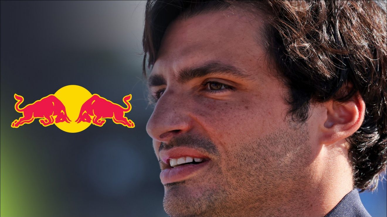 Carlos Sainz at the 2025 British Grand Prix with a Red Bull logo in the background