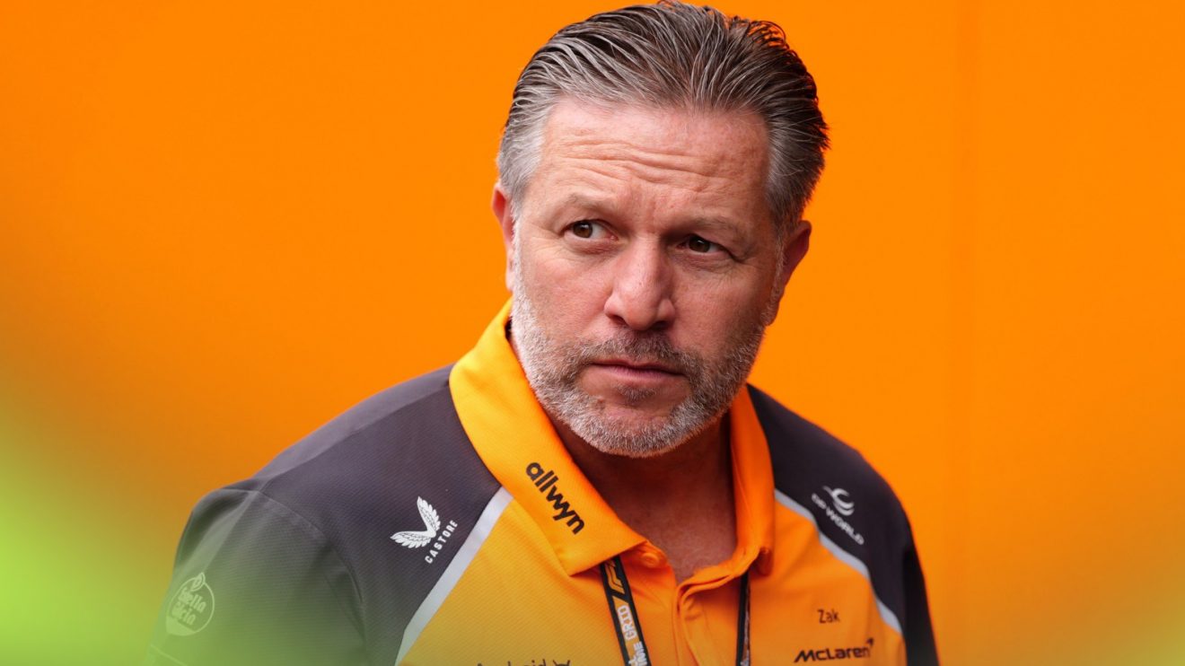 McLaren Racing CEO Zak Brown pictured against a papaya backdrop at the 2025 Hungarian Grand Prix