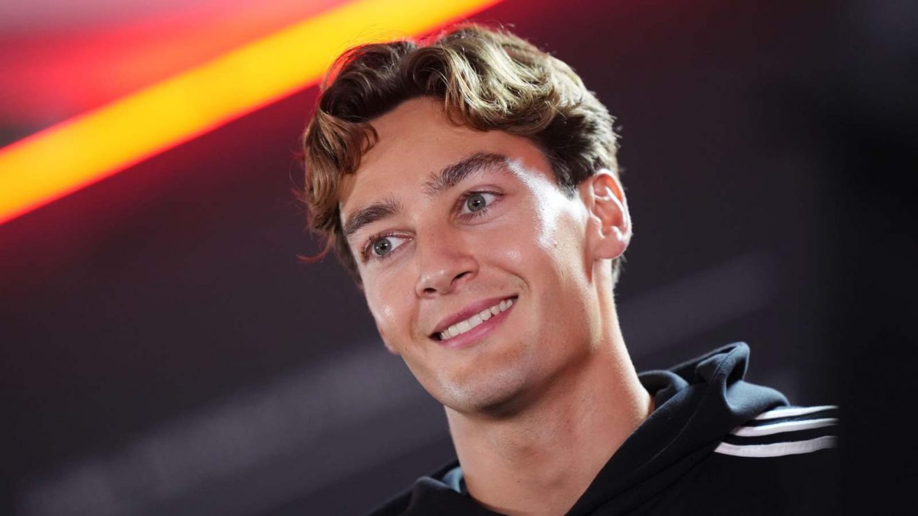George Russell smiles in media day at the Dutch Grand Prix.