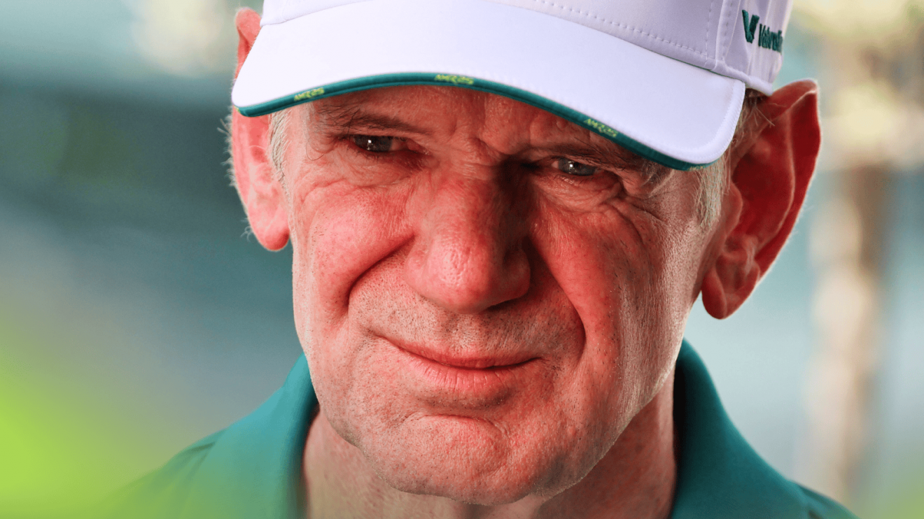 A close-up shot of Adrian Newey in Aston Martin uniform