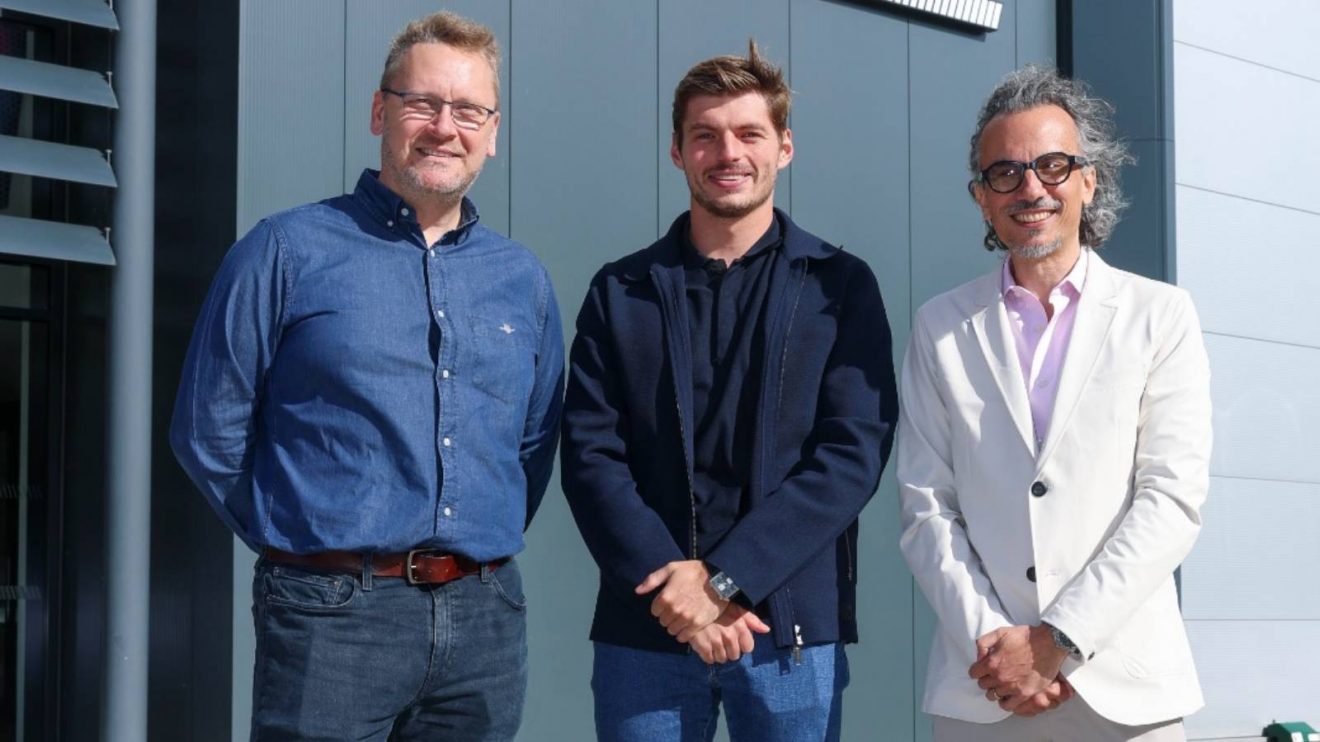 Red Bull's Max Verstappen with Ben Hodgkinson and Laurent Mekies.