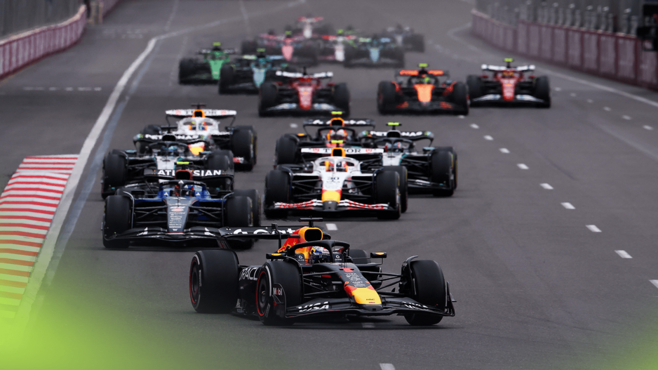 The F1 field, led by Max Verstappen, approaches the first corner at the 2025 Azerbaijan Grand Prix
