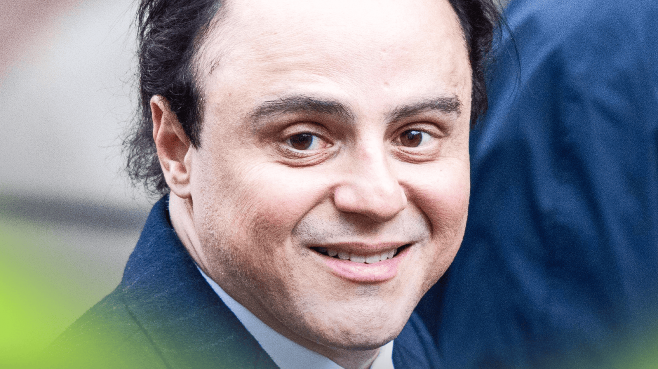 Felipe Massa smiles at the camera on the third and final day of his hearing at the Royal Courts of Justice