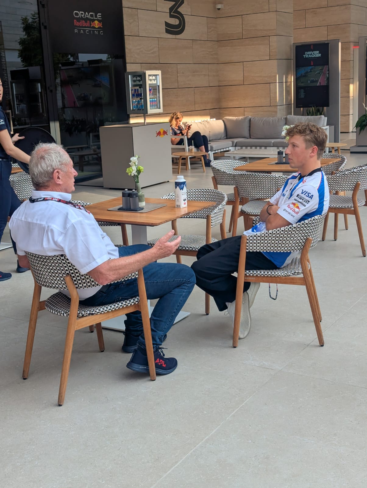 Liam Lawson in conversation with Helmut Marko in Qatar