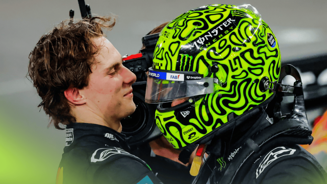 A close-up shot of Oscar Piastri and Lando Norris embracing on the grid after the race in Abu Dhabi
