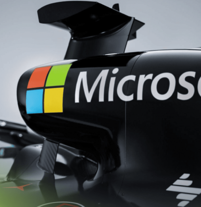 A large Microsoft logo on the rollhoop of a Mercedes F1 car