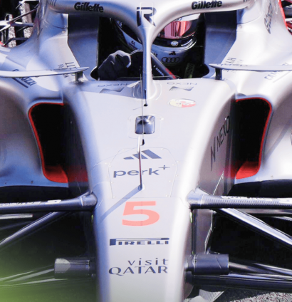 A close-up shot of the narrow sidepod inlets of the Audi R26