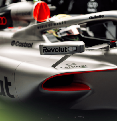 Gabriel Bortoleto sitting in the Audi R26 car in the garage