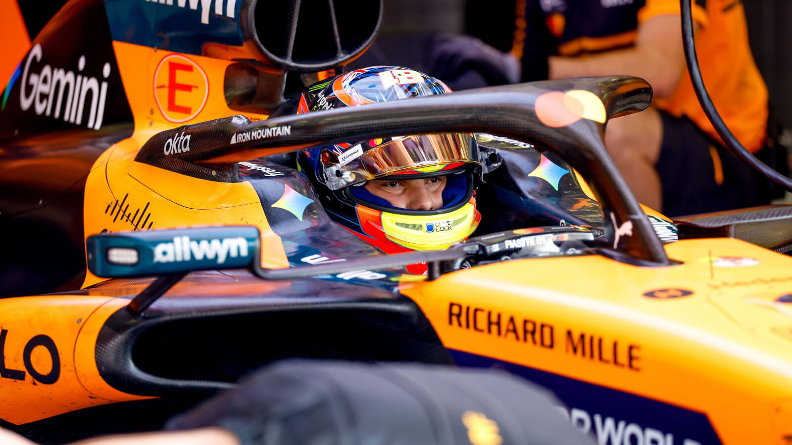 Oscar Piastri in the MCL40 in the McLaren garage