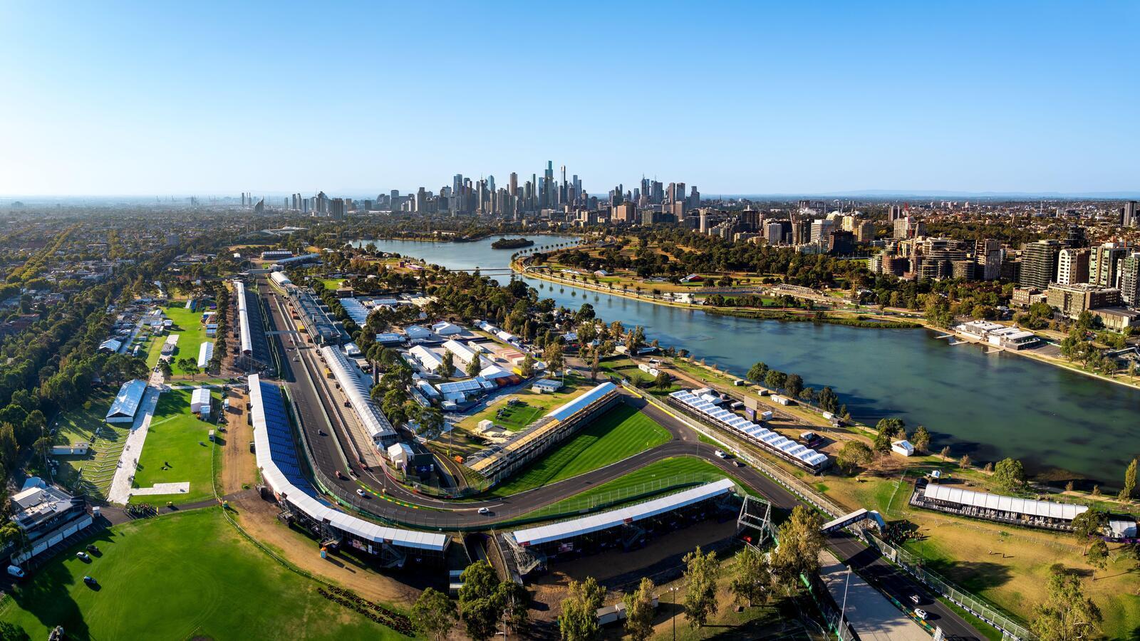 An aerial view of Albert Park, looking across the circuit to the Melbourne CBD.