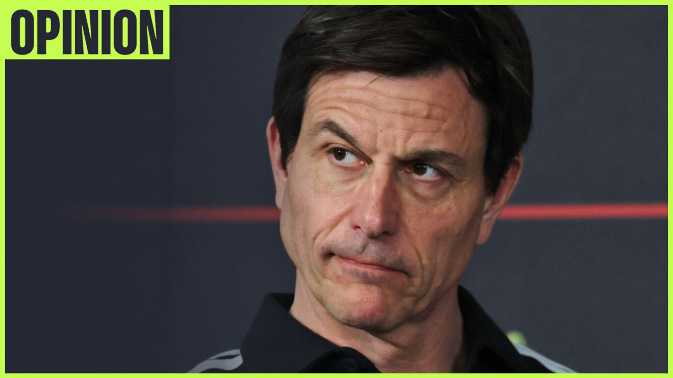 A close-up shot of Toto Wolff looking on in a press conference in Bahrain